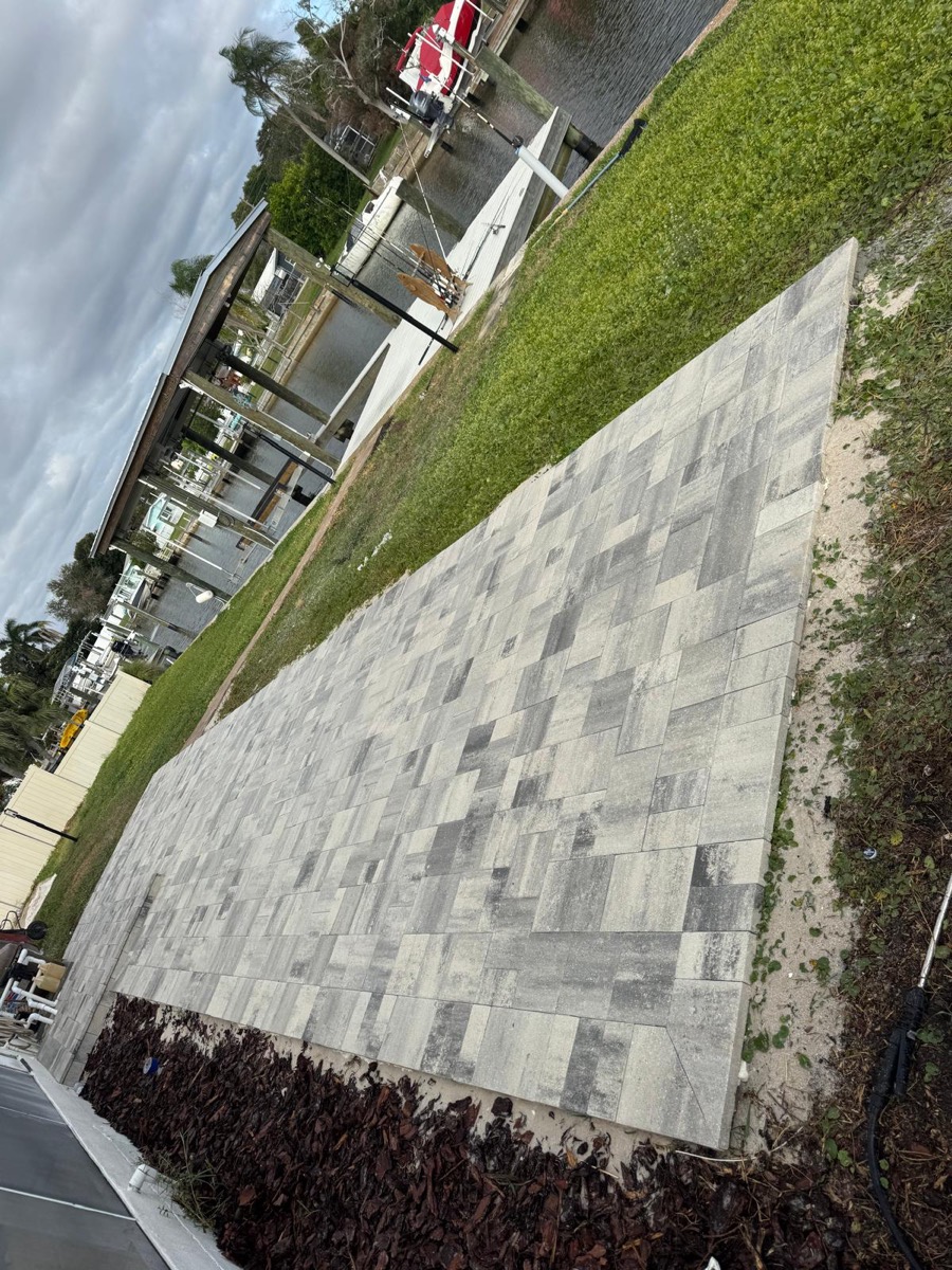 Large paver pad by a canal